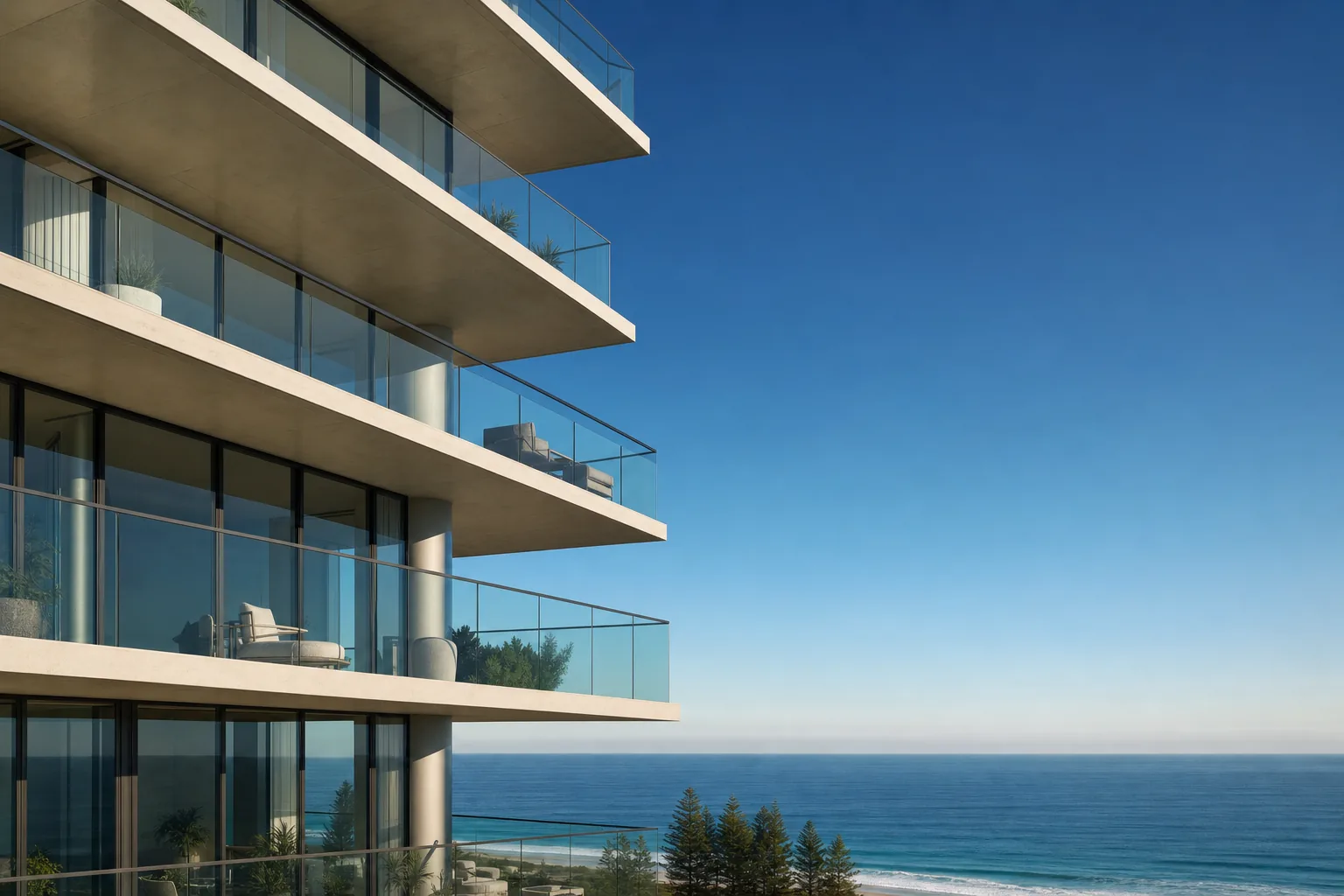 A Gold Coast apartment tower seen from below, cantilevered concrete balconies with frameless glass balustrades stacked against a clear sky, ocean beyond — illustrative example